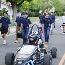 Students from project Green Speed with their electric racecar.