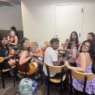 Image of Sprout Ups' college teachers painting pots as part of a club social event.